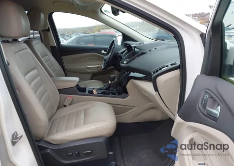 2017 Ford Escape Titanium z USA, uszkodzony, nr VIN 1FMCU0JD3HUC58564